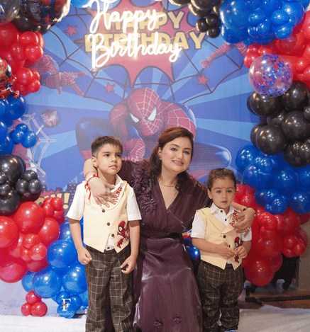 Children celebrating a birthday party at Wooray with balloon decor